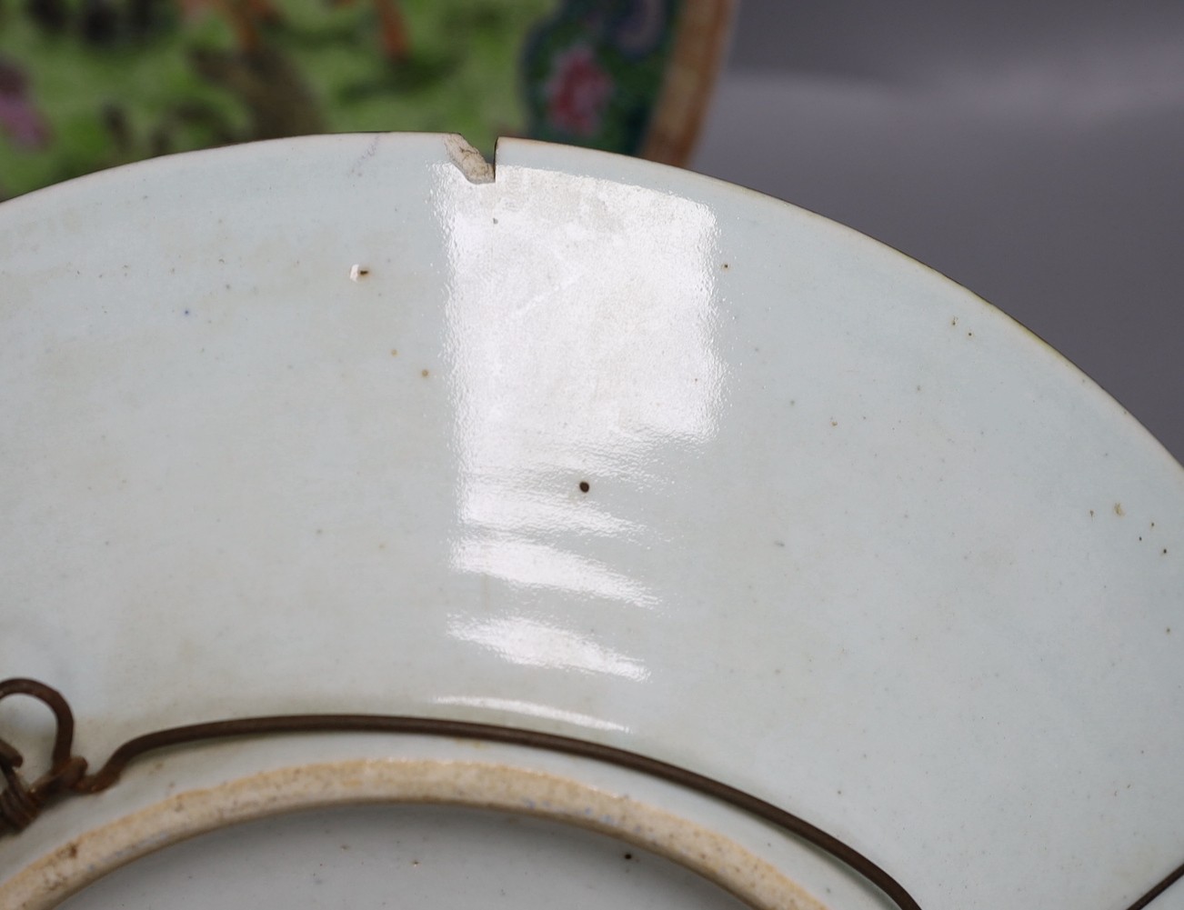 Two Chinese Republic period famille rose dishes, damaged, largest 33cm